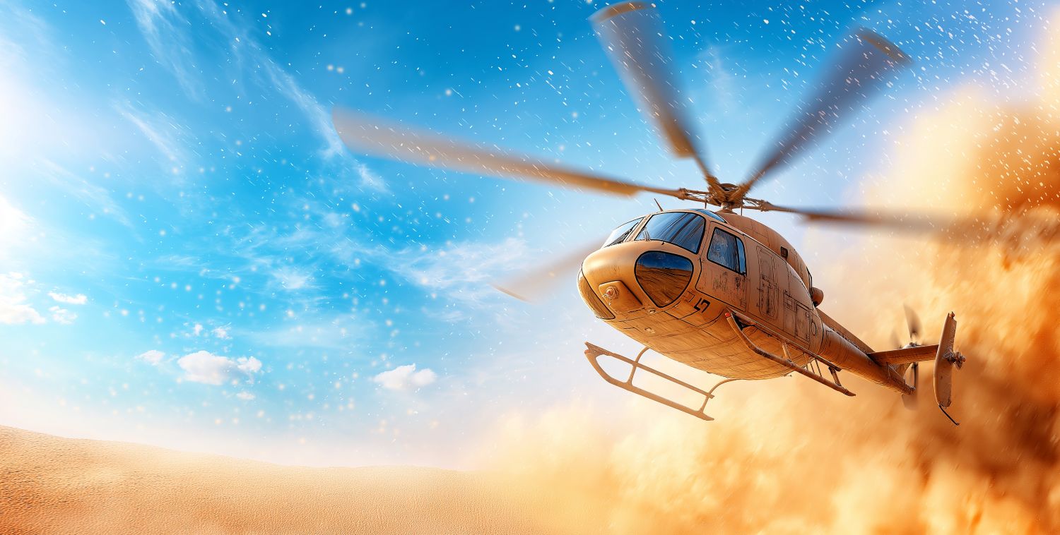 Ein Helikopter fliegt über eine sandige Wüste, aufwirbelnder Staub und klarer blauer Himmel im Hintergrund